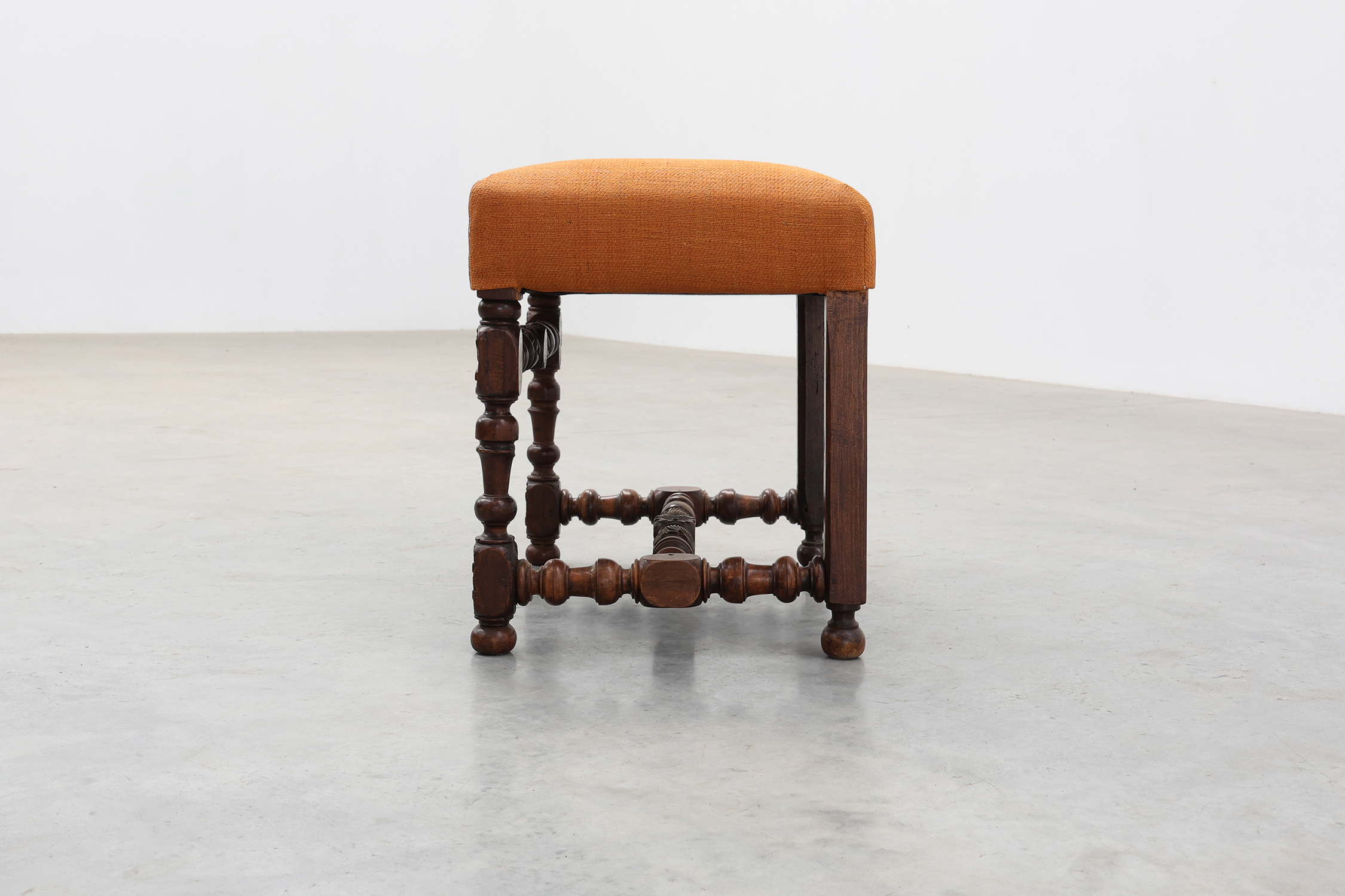 Louis XIII walnut stool with carved turned stretchers and upholstered seat, France, 17th centurythumbnail